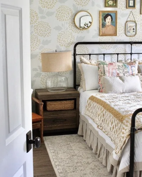 Bedroom styling with floral wallpaper and gallery wall
