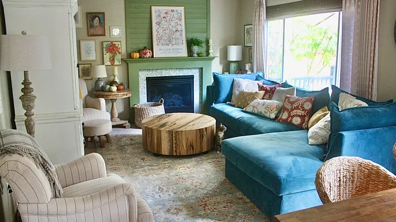 Bold living room with teal sofa and fall decor
